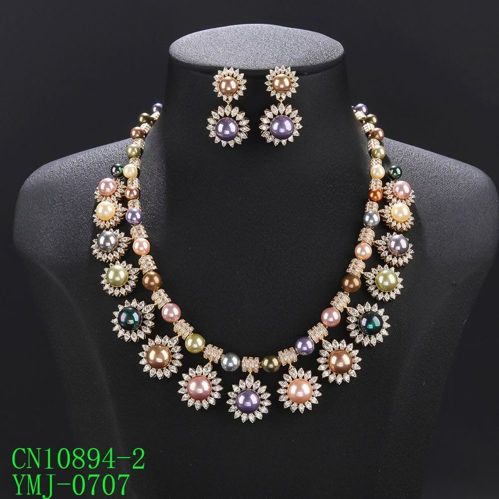 The Multi-Tone Pearl & CZ Sunburst Statement Necklace