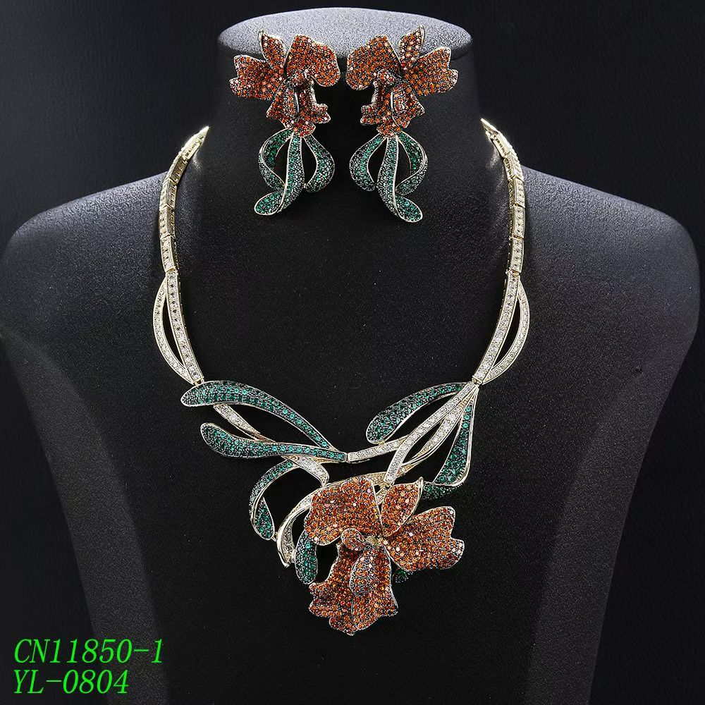 Couture Pavé Ribbon & Sculpted Lily Statement Set